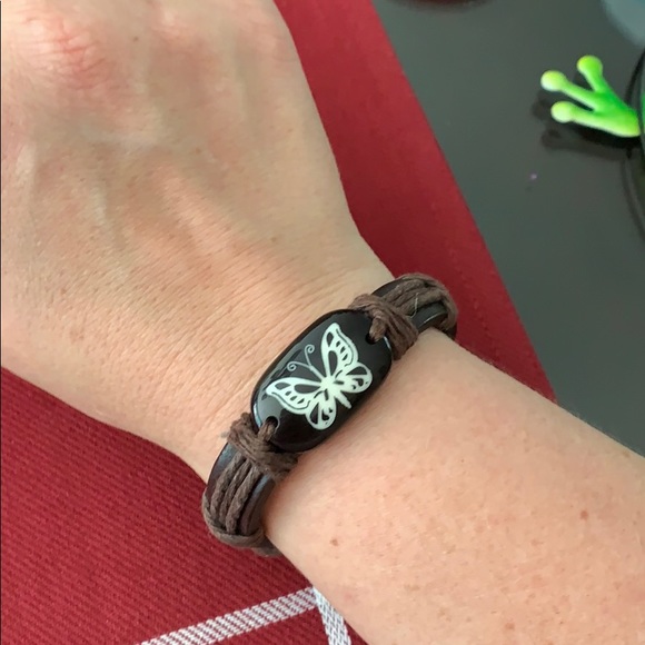 Jewelry - Adjustable leather like bracelet with butterfly